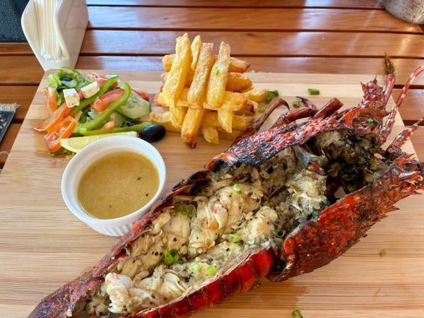 Freshly caught grilled crayfish platter fresh seafood at The Captain's Table restaurant Barra Beach Mozambique