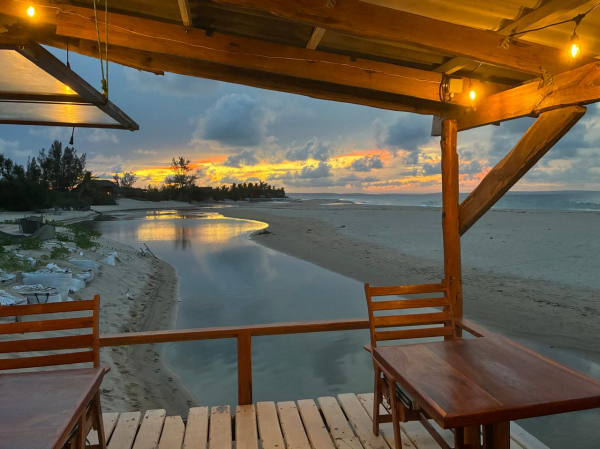 Beautiful sunset beachfront dining experience at The Captain's Table Praia de Barra Mozambique